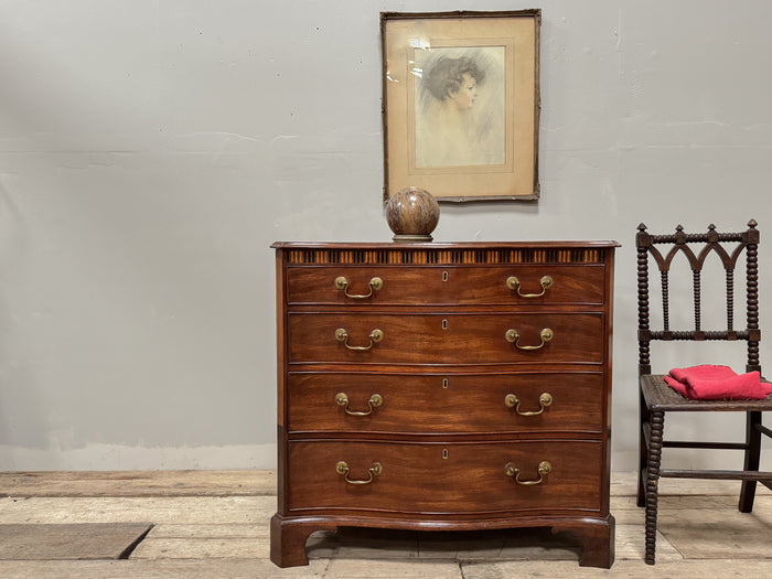 A George III Mahogany Serpentine Chest of Drawers