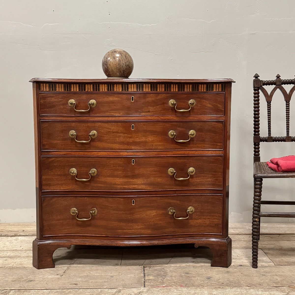 A George III Mahogany Serpentine Chest of Drawers