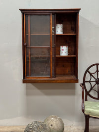 An Early 20th Century Glazed Cabinet