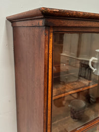 An Early 20th Century Glazed Cabinet