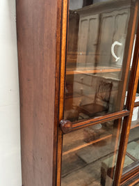 An Early 20th Century Glazed Cabinet