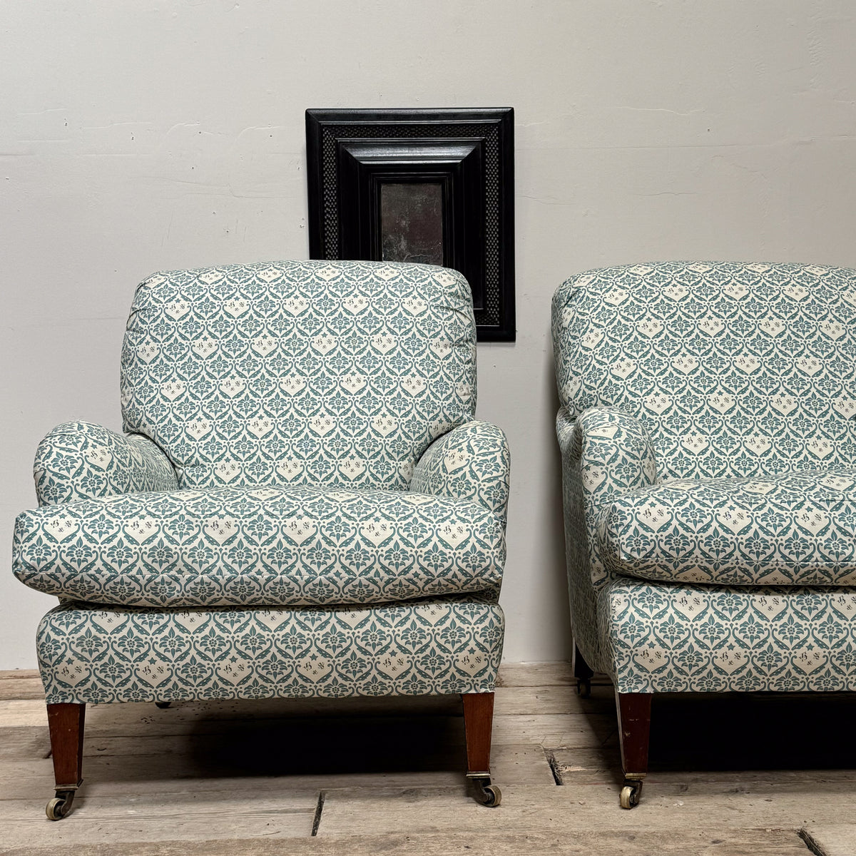 A Pair of Early 20th Century Howard & Sons 'Bridgewater' Armchairs