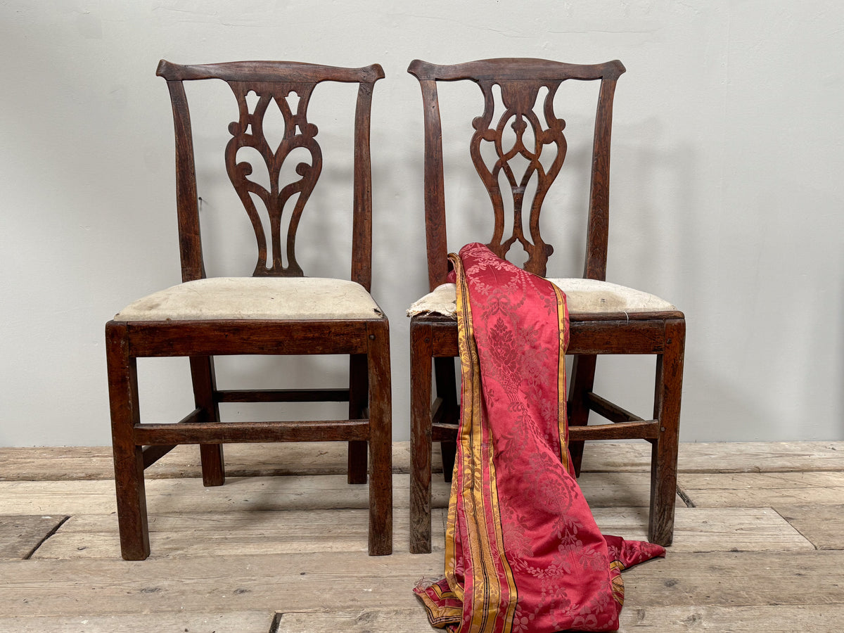 A Pair of Early George III Oak Chairs