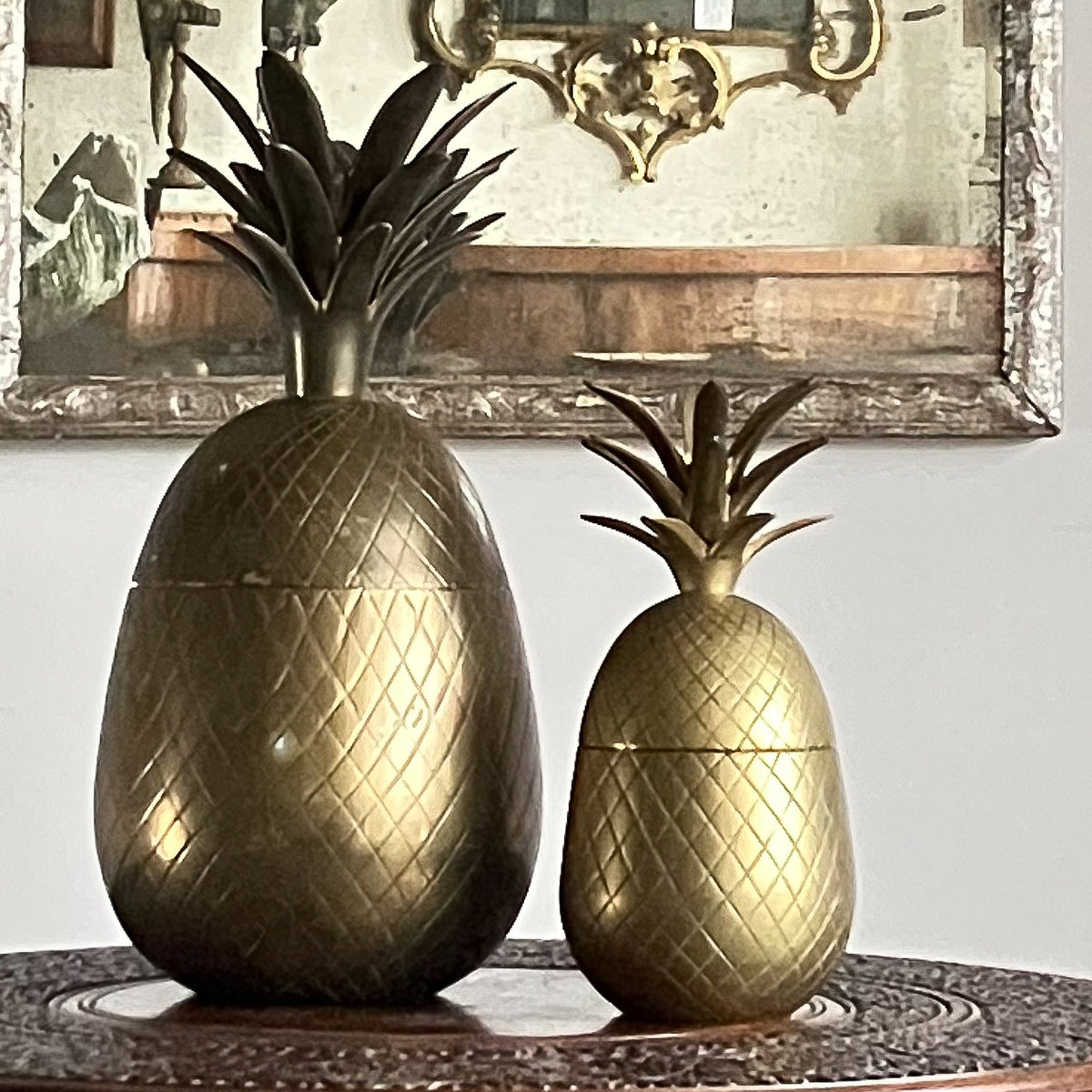 A Family of Mid Century Brass Pineapple Buckets