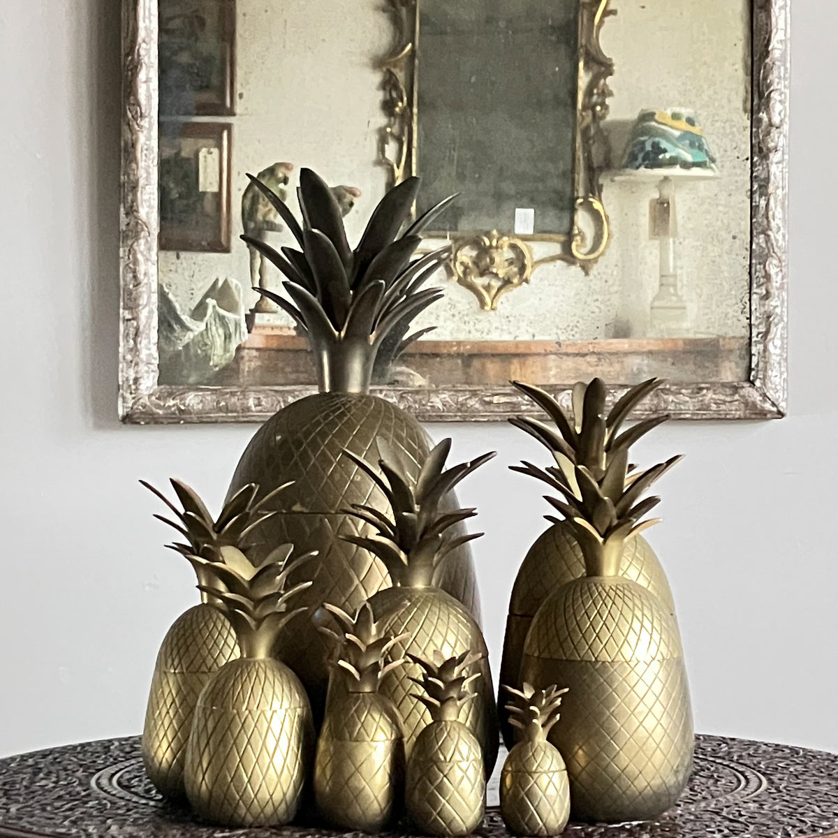 A Family of Mid Century Brass Pineapple Buckets