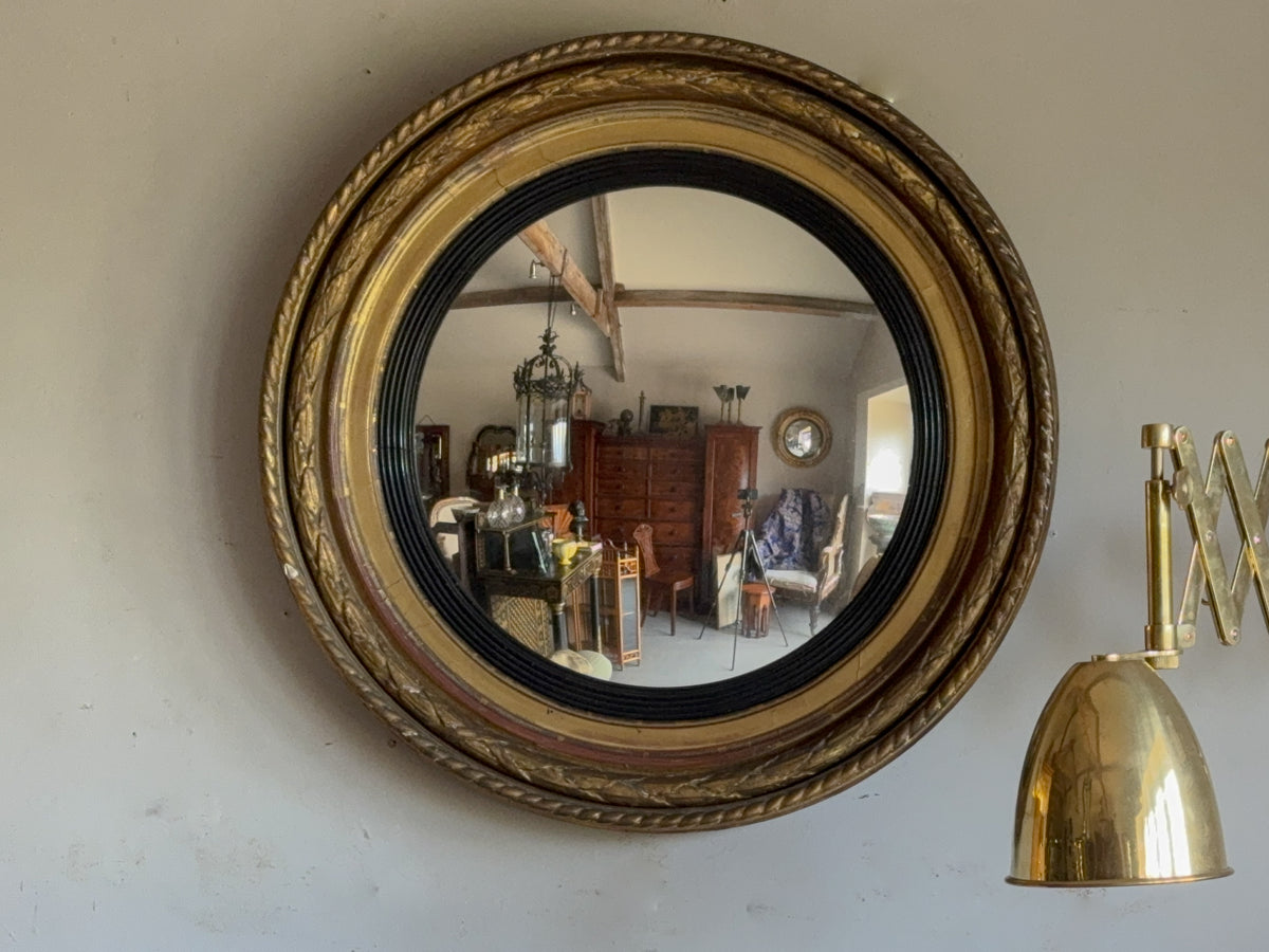 A Regency Giltwood Convex Mirror