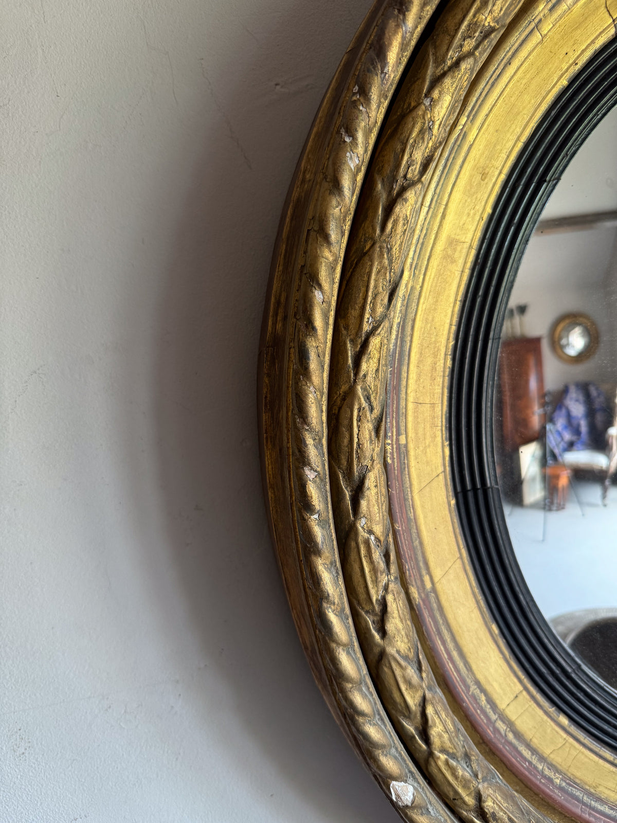 A Regency Giltwood Convex Mirror