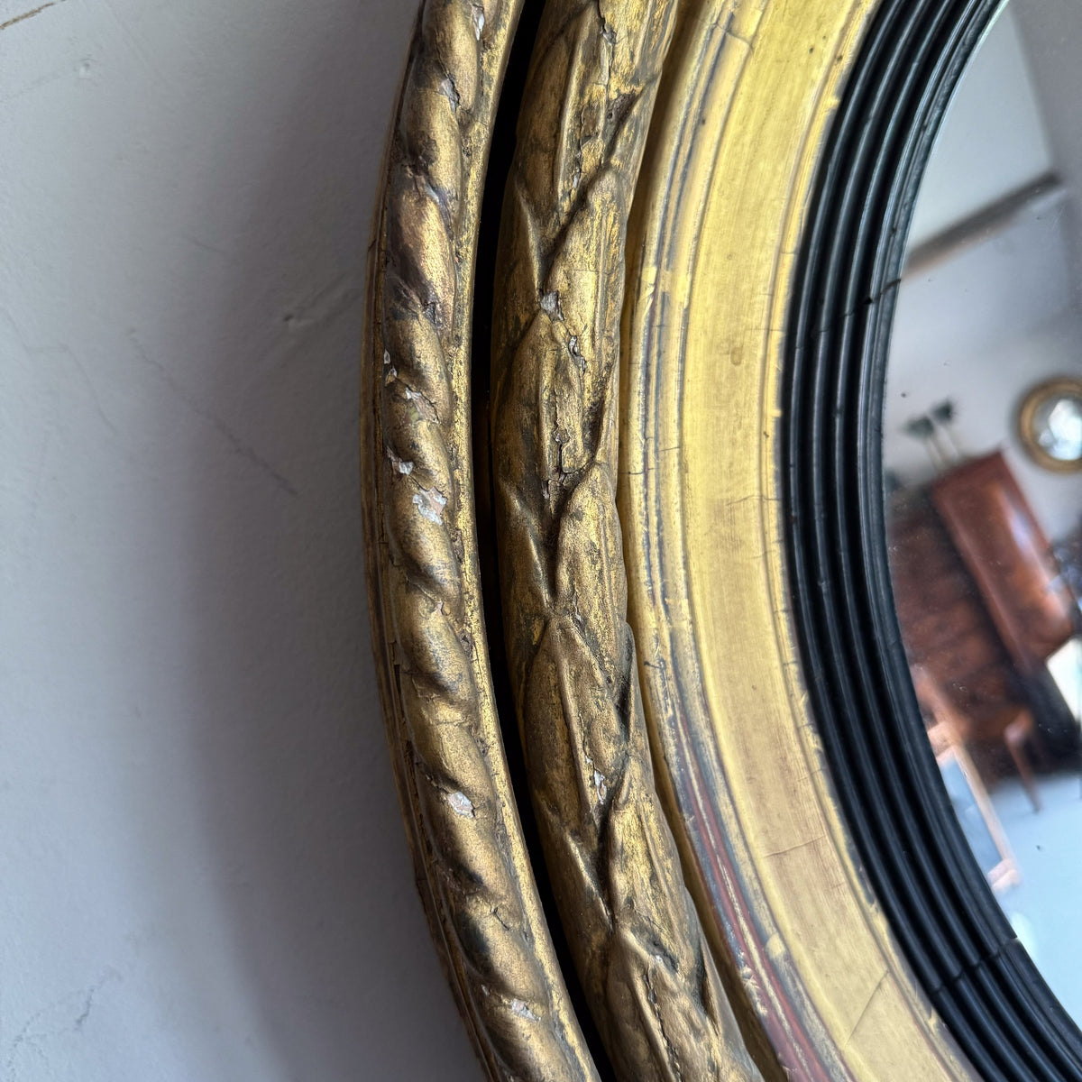 A Regency Giltwood Convex Mirror