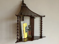 A George III Mahogany Corner Shelf