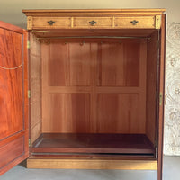 A Late 19th Century Birds Eye Maple Wardrobe by Gillows