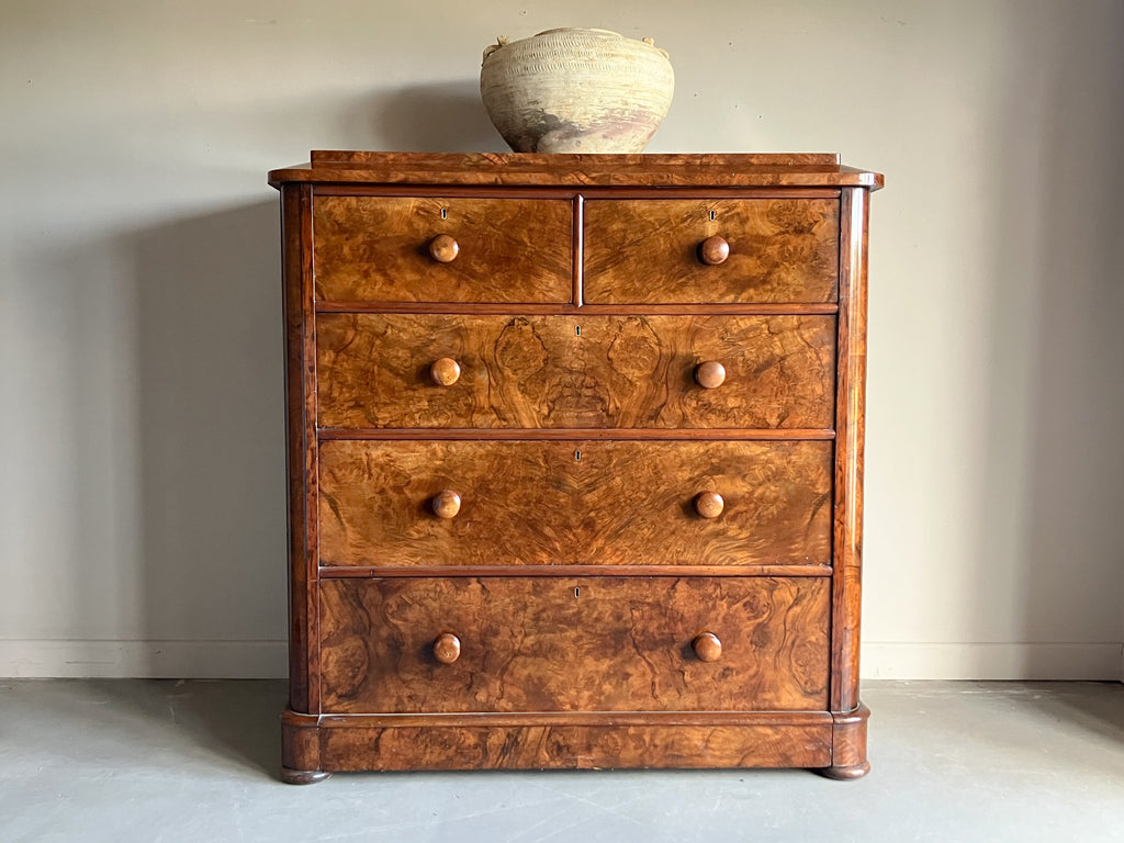 A Late 19th Century Walnut Veneered Chest of Drawers