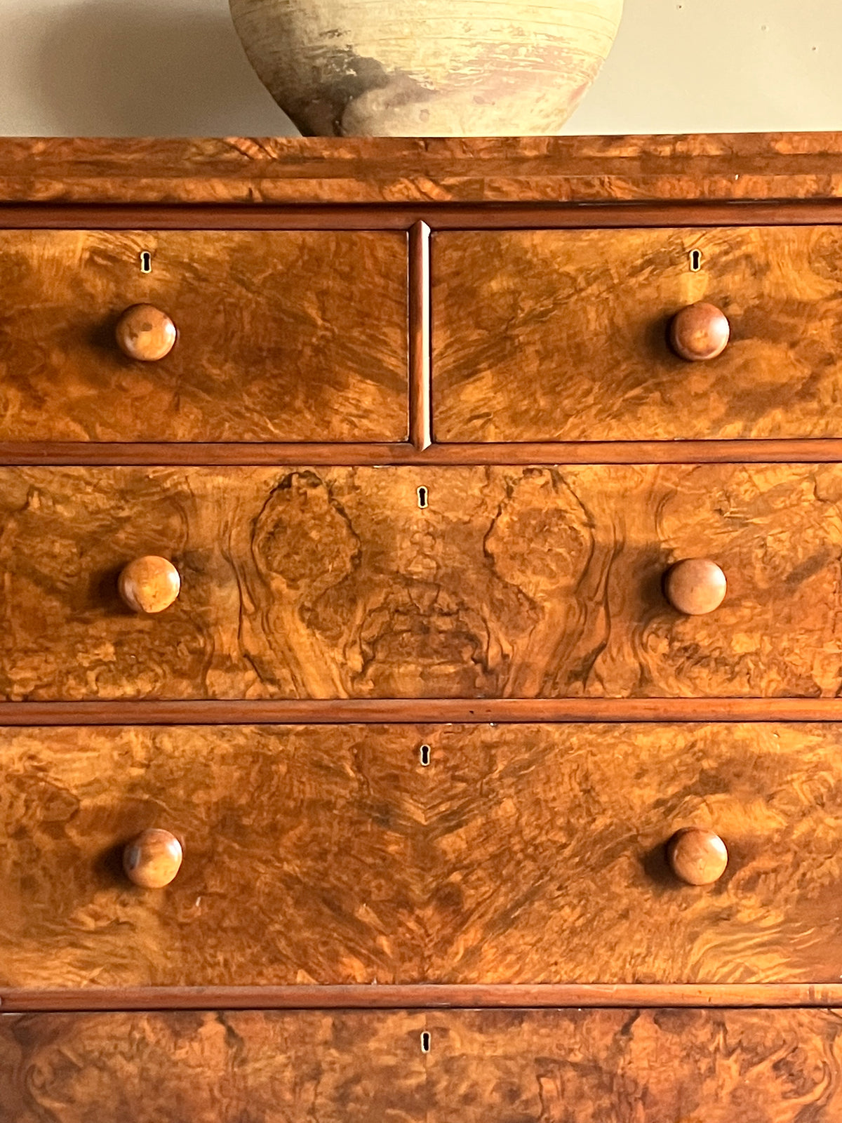 A Late 19th Century Walnut Veneered Chest of Drawers