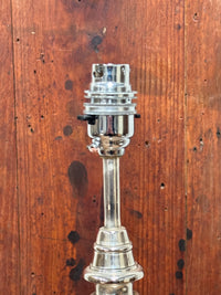 A Pair of Tall Silver Lamps