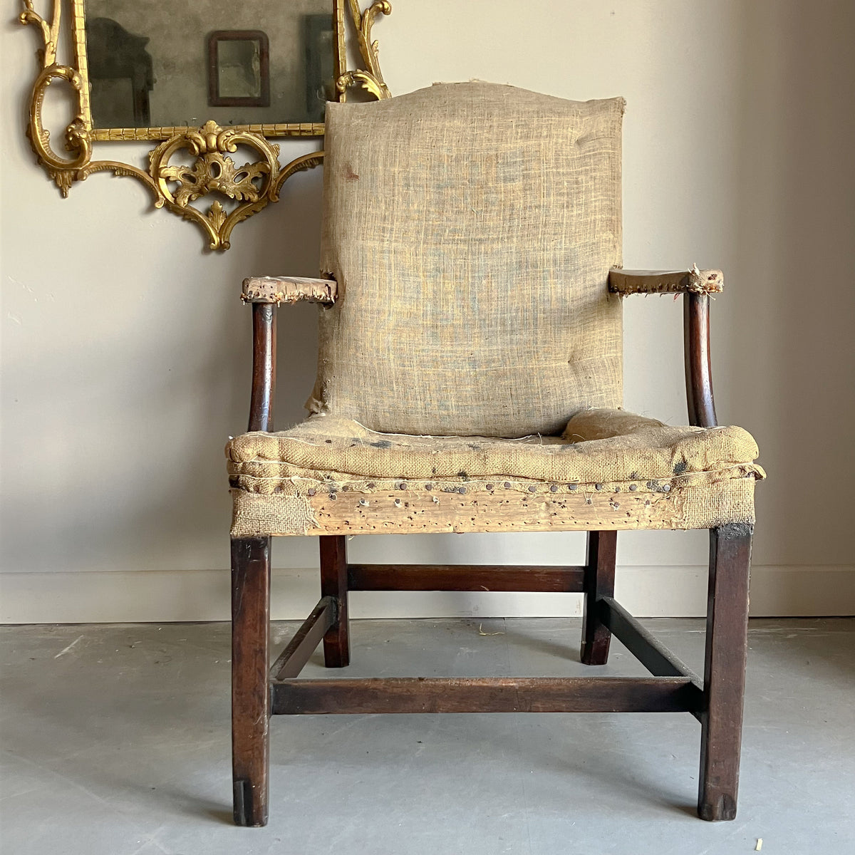 A Pair of George III Gainsborough Chairs