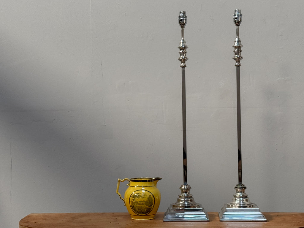 A Pair of Tall Silver Lamps