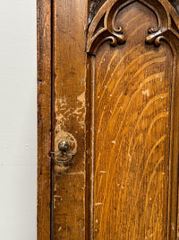 A Regency Pine Grain Painted Gothic Cupboard