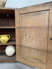 A Regency Pine Grain Painted Gothic Cupboard