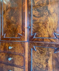 An Exceptional Mahogany Wardrobe