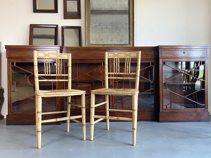 A Pair of Regency Faux Bamboo Chairs