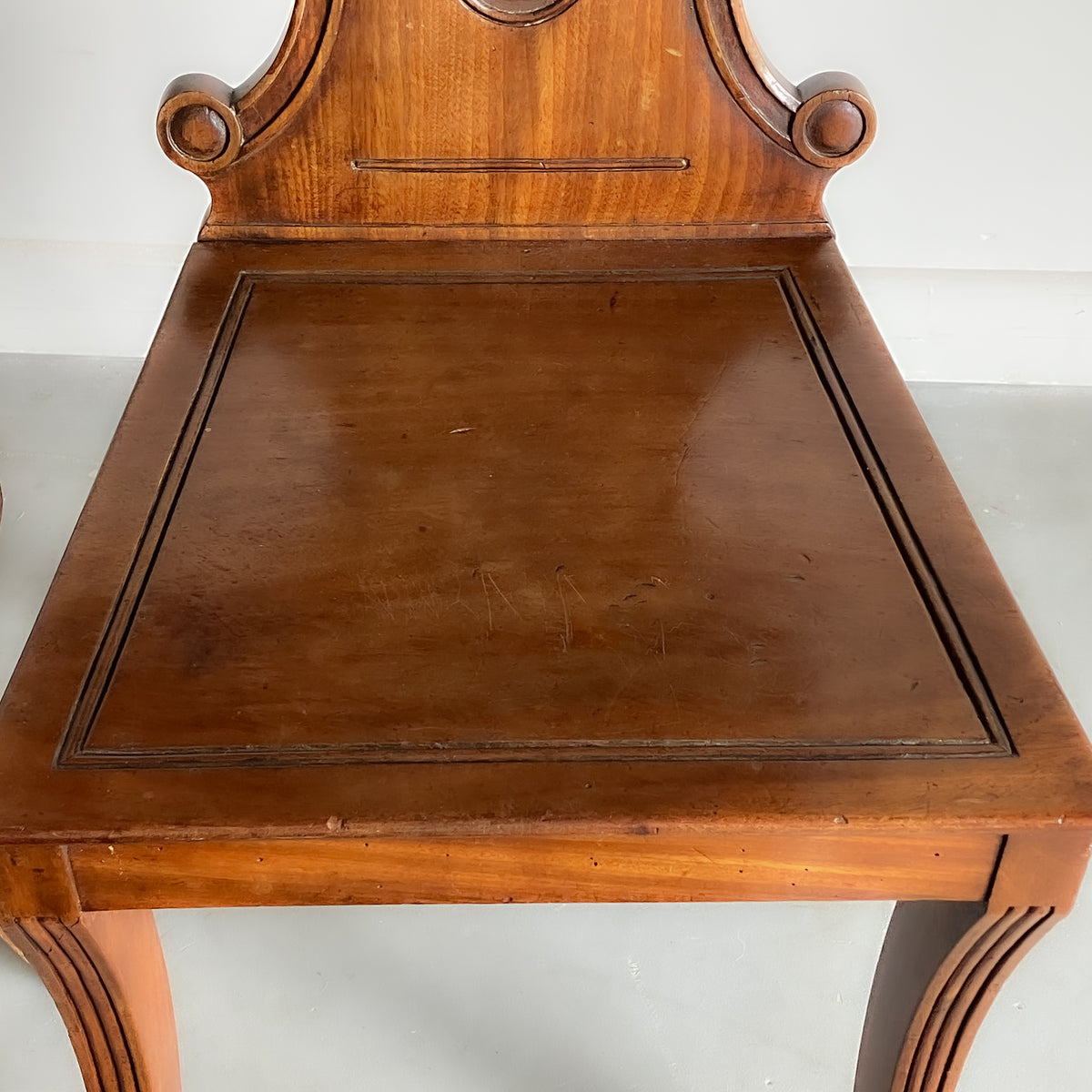 A Set of Early 19th Century Mahogany Hall Chairs