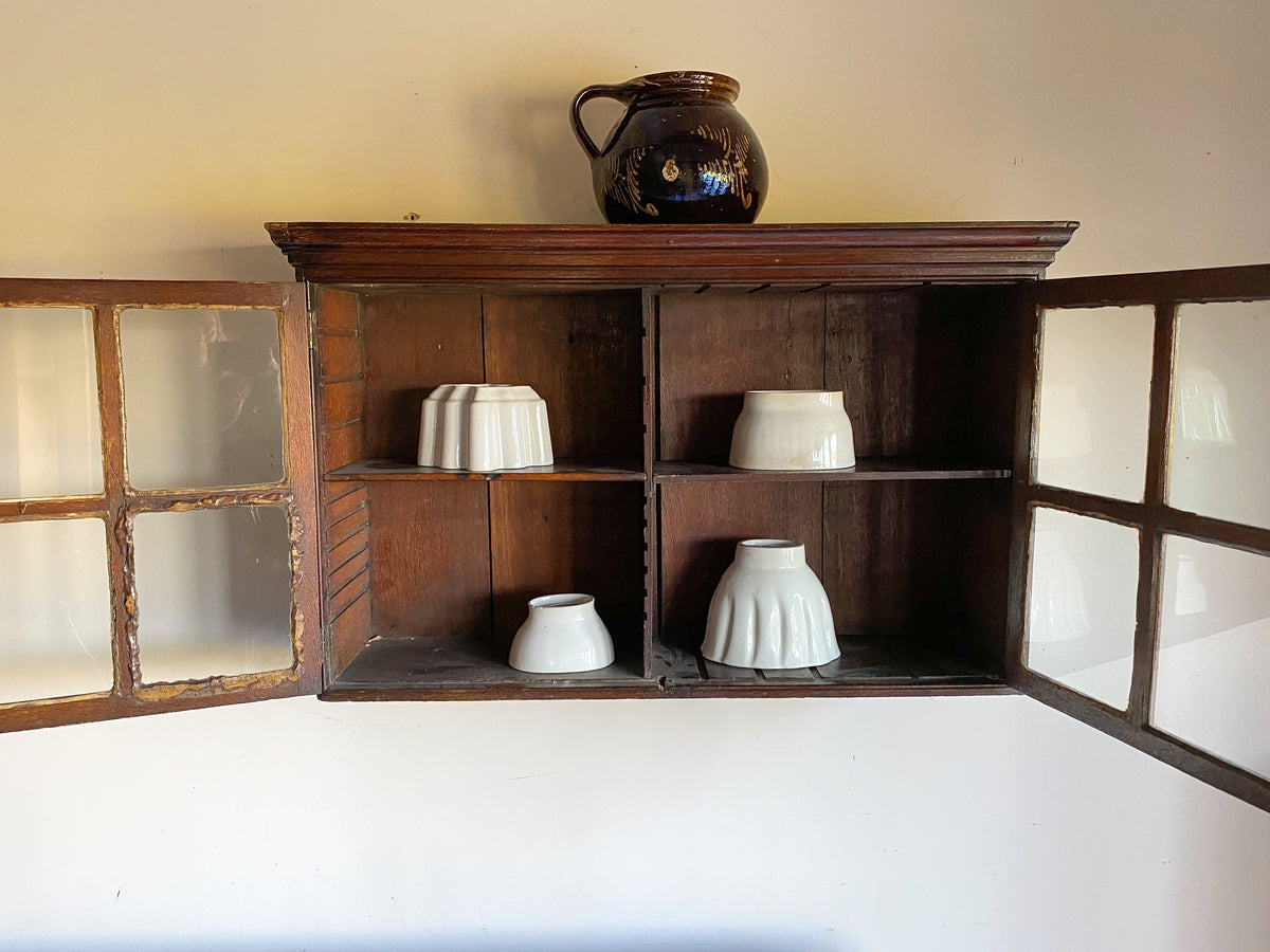 A George II Oak Hanging Cabinet