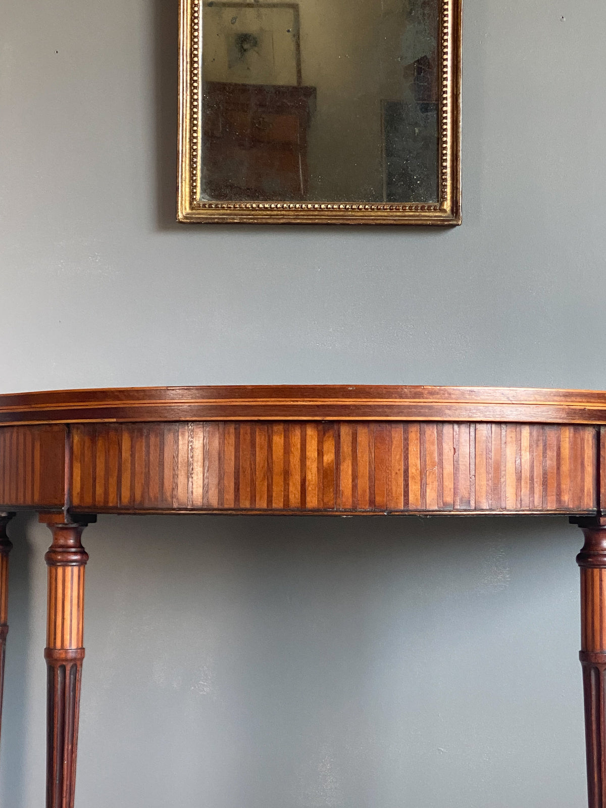 A George III Demi Lune Card Table