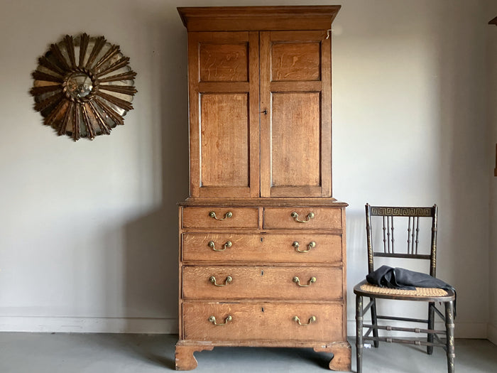 A George III Oak Cupboard