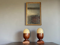 A Pair of Late 19th Century Mahogany Cups with Ostrich Eggs