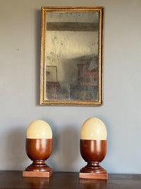 A Pair of Late 19th Century Mahogany Cups with Ostrich Eggs