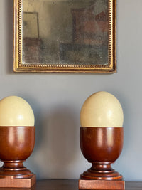 A Pair of Late 19th Century Mahogany Cups with Ostrich Eggs