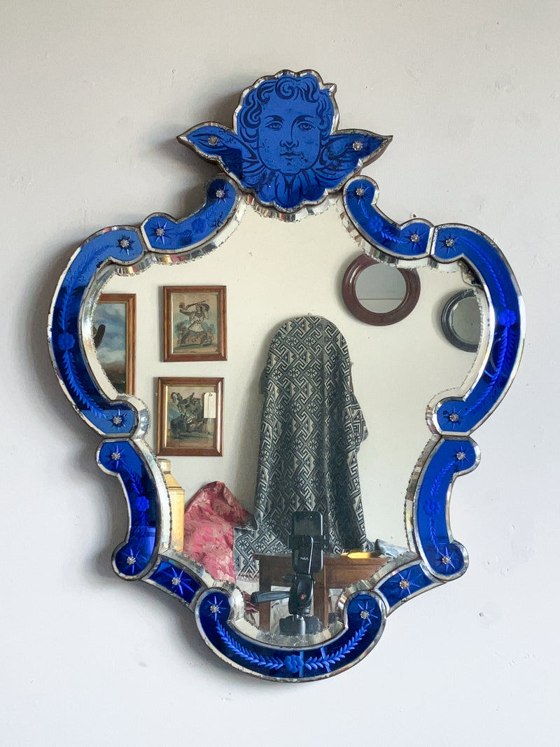 An Early 20th Century Venetian Blue Glass Mirror