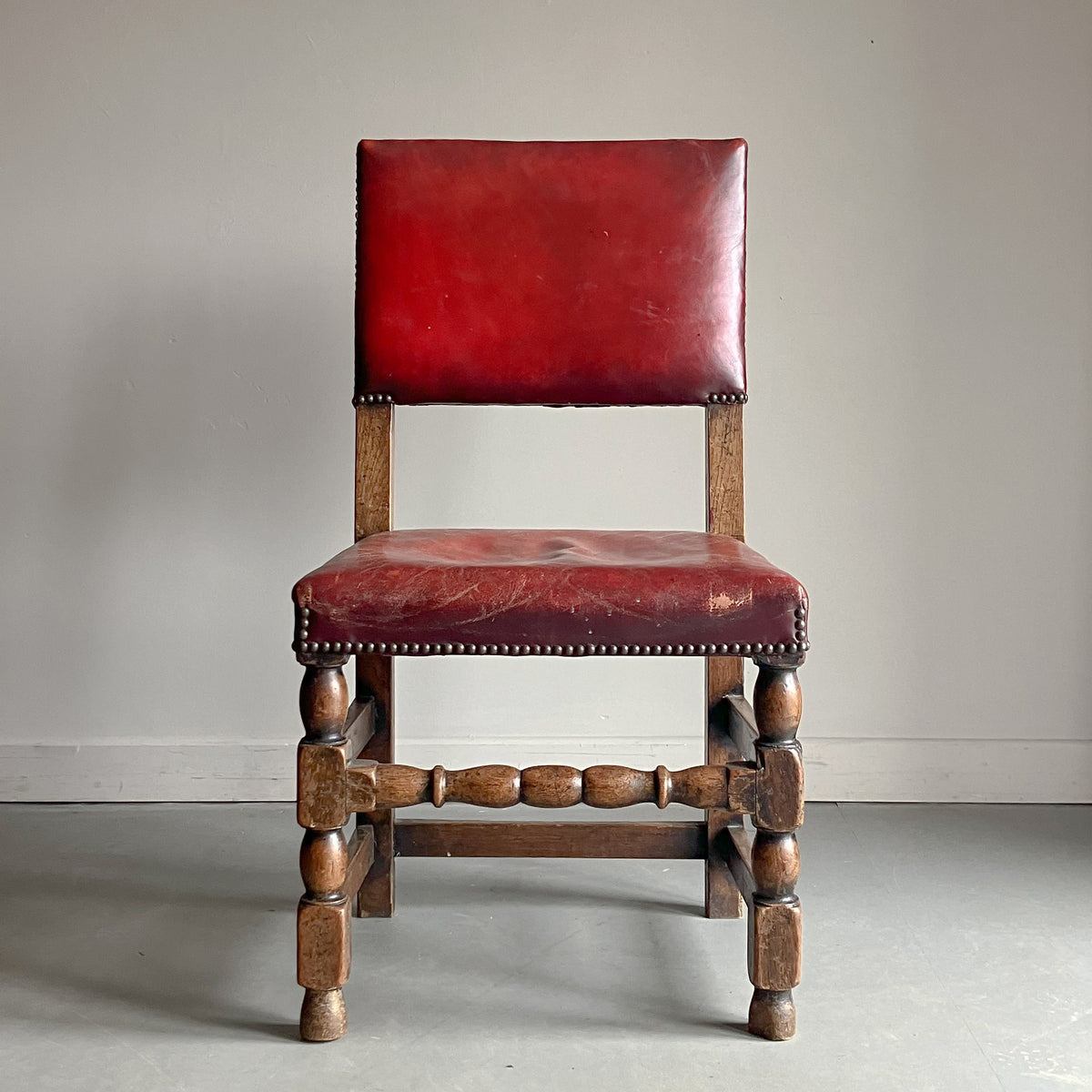 A Set of Early 20th Century Leather Upholstered Dining Chairs