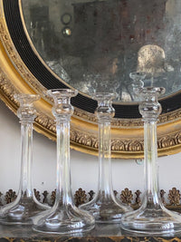 A Set of Four Mid 19th Century Cut Glass Candlesticks