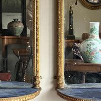 A Pair of Early 19th Century Giltwood Pier Mirrors