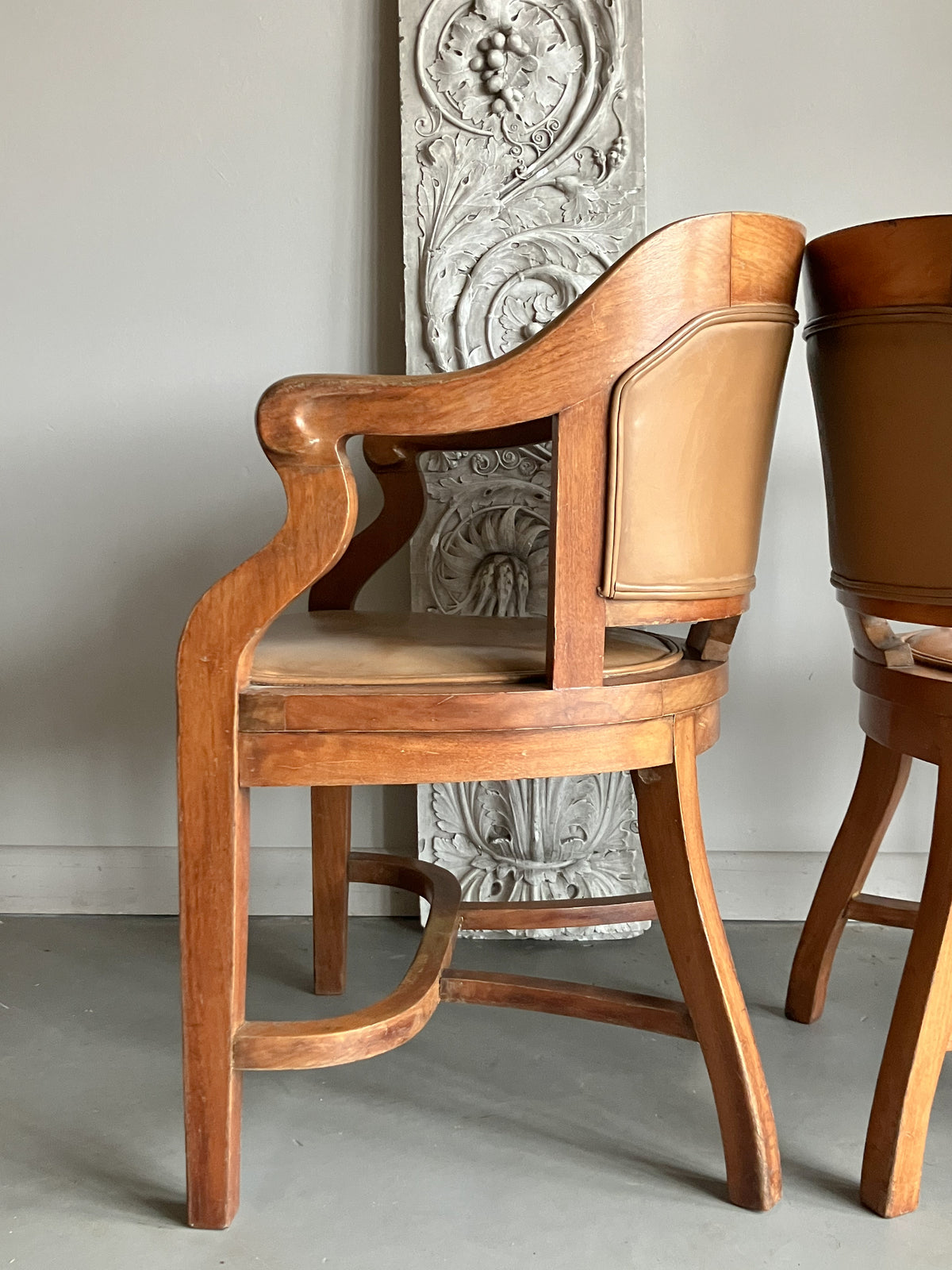 A Set of Twelve Early 20th Century Oak and Leather Dining Chairs