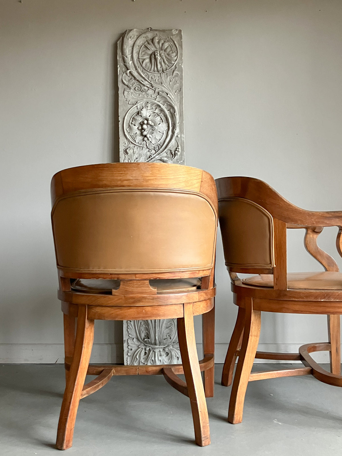 A Set of Twelve Early 20th Century Oak and Leather Dining Chairs