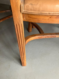 A Set of Twelve Early 20th Century Oak and Leather Dining Chairs