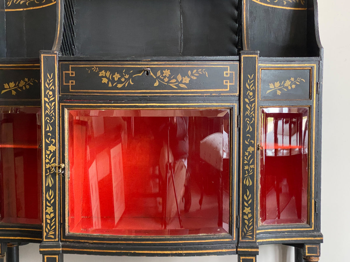 A Late Regency Ebonised and Gilt Side Cabinet