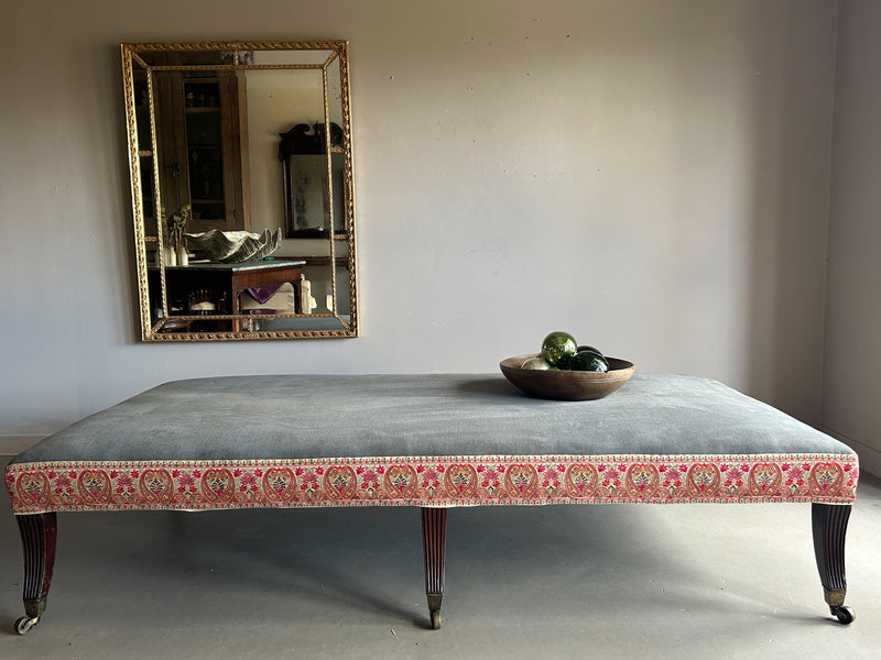 A Huge Upholstered Ottoman with 19th Century Rosewood Base