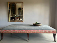 A Huge Upholstered Ottoman with 19th Century Rosewood Base