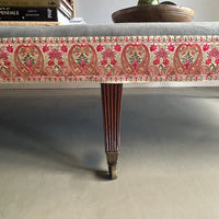 A Huge Upholstered Ottoman with 19th Century Rosewood Base