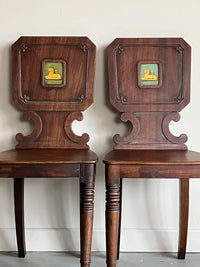 A Pair of Regency Mahogany Hall Chairs