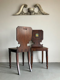 A Pair of Regency Mahogany Hall Chairs