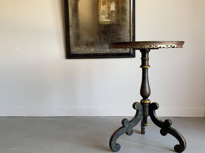 A Mid 19th Century Ebonised and Polychromed Table