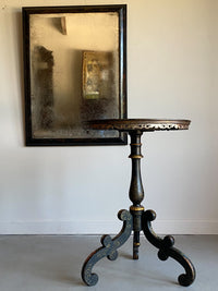 A Mid 19th Century Ebonised and Polychromed Table