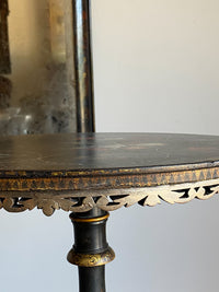 A Mid 19th Century Ebonised and Polychromed Table