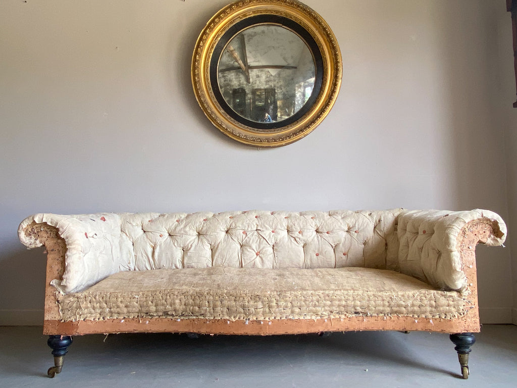 An Early Howard & Sons Chesterfield Sofa