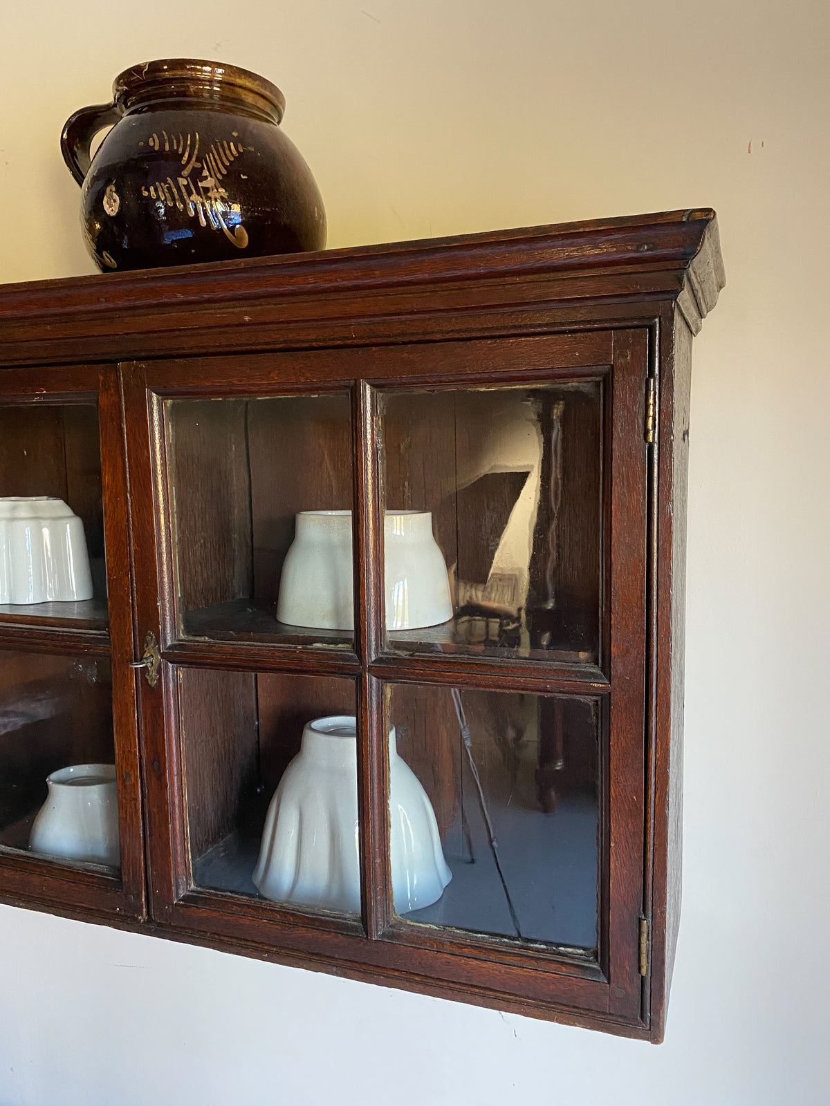 A George II Oak Hanging Cabinet