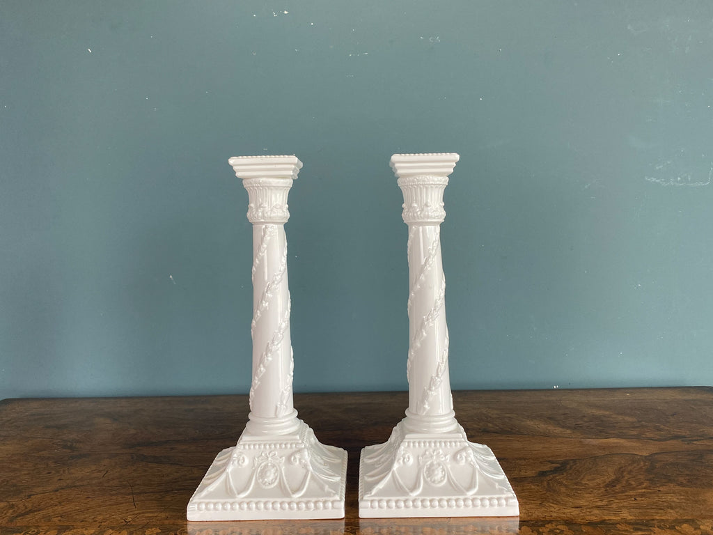 A Pair of Royal Worcester Candlesticks