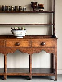 An Early 19th Fruitwood Pot Board Dresser